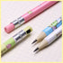 mechanical pencils with colorful barcodes and cartoon animal designs